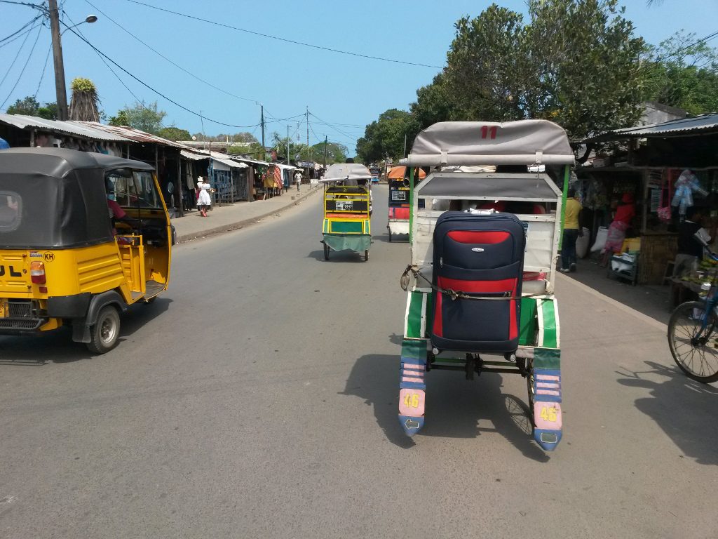Moving house by pousse pousse (cycle rickshaw). Most of my stuff and my translator is on this rickshaw!
